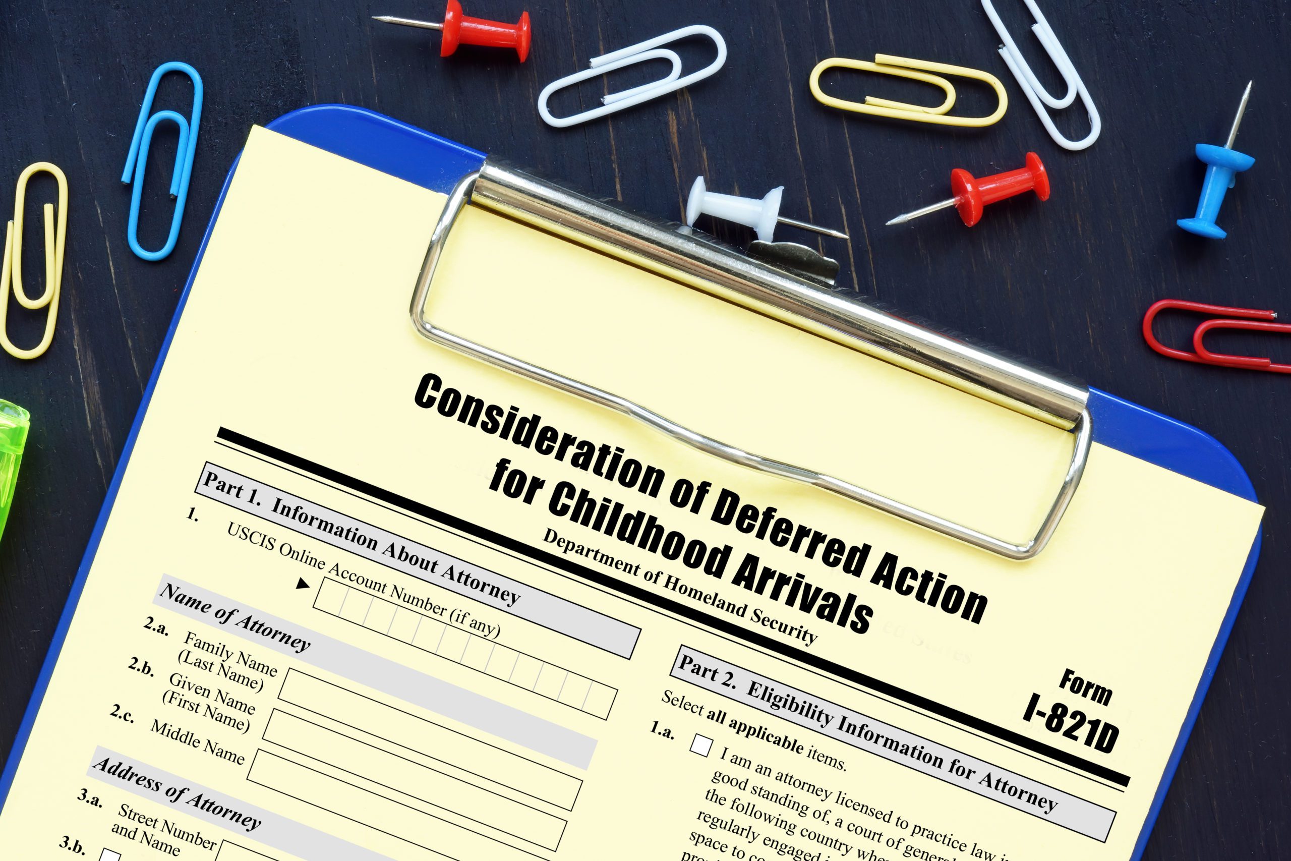 A Form I-821D for consideration of deferred action for childhood arrivals on a table
